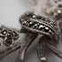 Broche vintage de plata de ley y marcasitas con diseño de lazo, 10.5 g