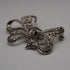 Broche vintage de plata de ley y marcasitas con diseño de lazo, 10.5 g