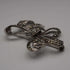 Broche vintage de plata de ley y marcasitas con diseño de lazo, 10.5 g