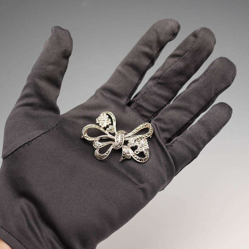 Broche vintage de plata de ley y marcasitas con diseño de lazo, 10.5 g