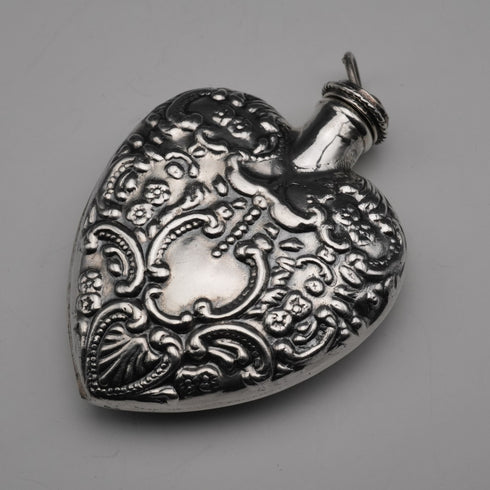 Frasco de perfume vintage de plata esterlina en forma de corazón