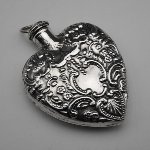 Frasco de perfume vintage de plata esterlina en forma de corazón