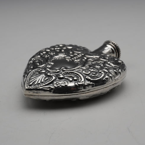 Frasco de perfume vintage de plata esterlina en forma de corazón
