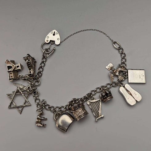 Pulsera con dijes de plata esterlina vintage británica, 31 g