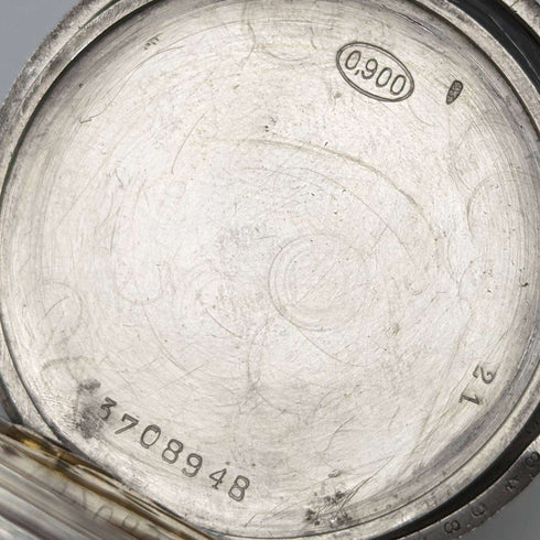 Reloj de bolsillo Longines antiguo de hacia 1921, caja de plata con decoración nielada, en buen estado de funcionamiento.