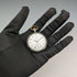 Reloj de bolsillo Longines antiguo de hacia 1921, caja de plata con decoración nielada, en buen estado de funcionamiento.
