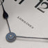 Reloj de bolsillo Longines antiguo, circa 1928, caja saboneta de plata grabada, en buen estado de funcionamiento.