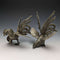 Pareja de figuras de gallo de peltre vintage