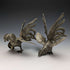 Pareja de figuras de gallo de peltre vintage