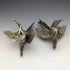 Pareja de figuras de gallo de peltre vintage