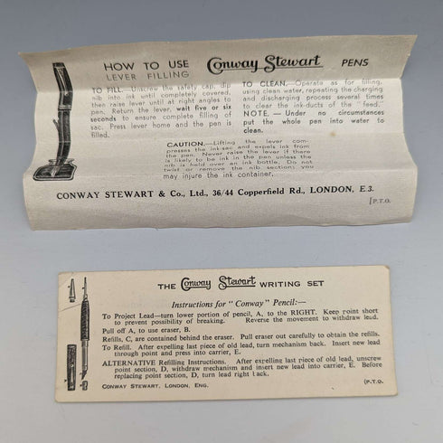 Set de pluma estilográfica y portaminas vintage Conway Stewart de Reino Unido, color negro, en estuche.