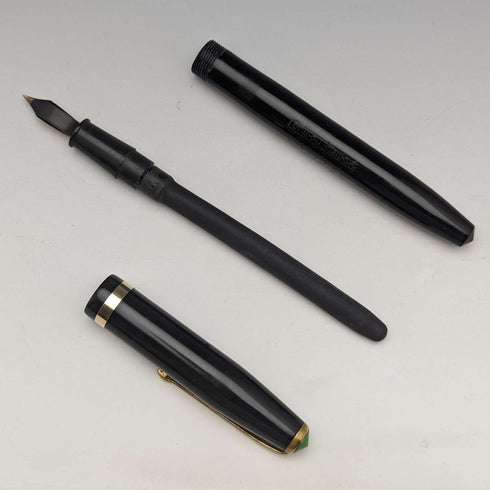 Set de pluma estilográfica y portaminas vintage Conway Stewart de Reino Unido, color negro, en estuche.