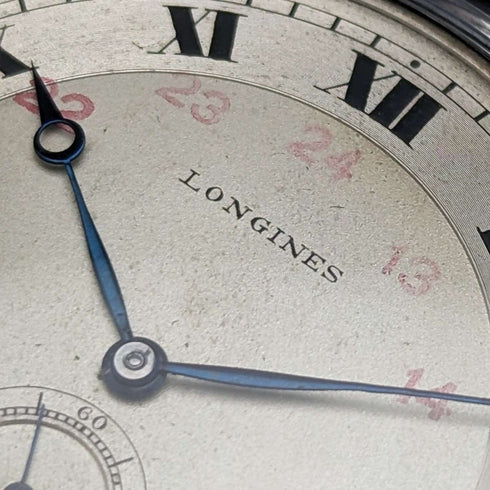 Reloj de bolsillo Longines antiguo, circa 1916, caja de plata delgada de cara abierta, en buen estado de funcionamiento