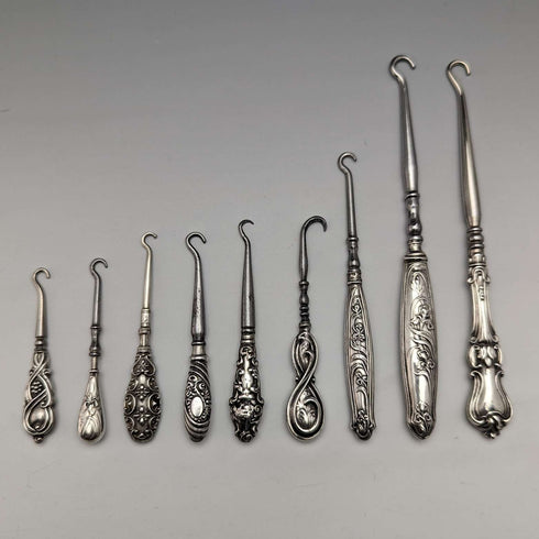 Juego de 9 botones de gancho con mango de plata chapada, antigüedades británicas de alrededor de 1910