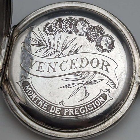 Reloj de bolsillo suizo antiguo Vencedor de principios del siglo XX, caja de plata con grabado de mariposa, en buen estado de funcionamiento.
