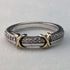 Anillo vintage británico de oro de 9 quilates, plata de ley y diamantes pequeños