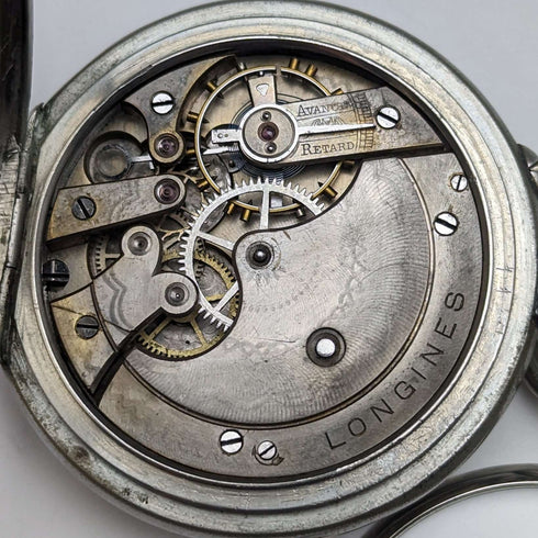 Reloj de bolsillo antiguo Longines, circa 1897, tipo open face con cristal, en buen estado de funcionamiento