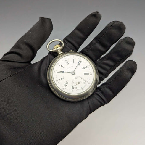 Reloj de bolsillo antiguo Longines, circa 1897, tipo open face con cristal, en buen estado de funcionamiento