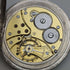 Reloj de bolsillo suizo antiguo, circa 1920, marca Escasany, caja delgada de plata con decoración de niel, en buen estado de funcionamiento.