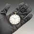 Reloj de bolsillo suizo antiguo, circa 1920, marca Escasany, caja delgada de plata con decoración de niel, en buen estado de funcionamiento.