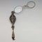 Lorgnette plegable de bolsillo de plata esterlina chapada en oro, antigüedad estadounidense