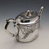 Tetera antigua de plata chapada, fabricada en Inglaterra alrededor de 1900, por James Deakin & Sons