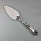 Circa 1910 American antique small cake slicer with sterling silver handle