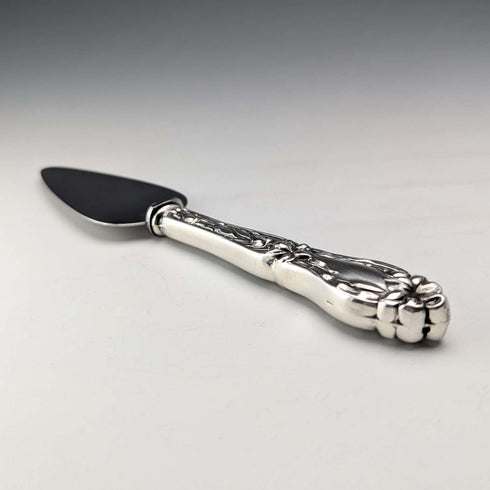 Circa 1910 American antique small cake slicer with sterling silver handle