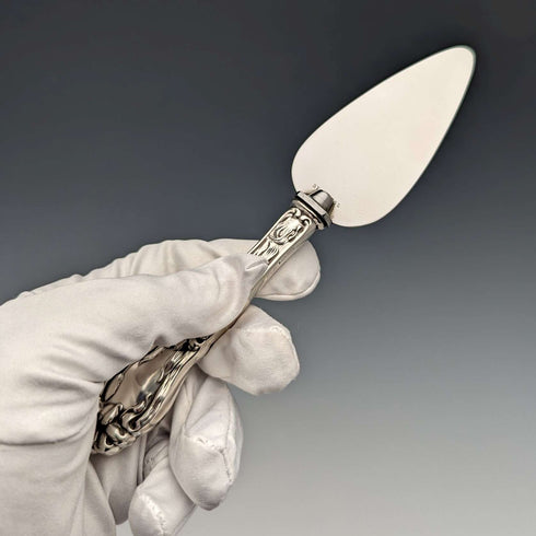 Circa 1910 American antique small cake slicer with sterling silver handle
