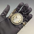 Reloj de bolsillo antiguo de fabricación suiza, sin marca, caja de plata con fino trabajo en nielo, tipo saboneta, en buen estado de funcionamiento.