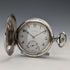 Reloj de bolsillo vintage Zenith de alrededor de 1930, caja tipo saboneta de plata con grabado detallado, en buen estado de funcionamiento