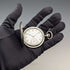 Reloj de bolsillo vintage Zenith de alrededor de 1930, caja tipo saboneta de plata con grabado detallado, en buen estado de funcionamiento