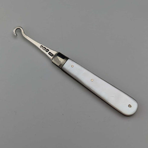 1904 British antique white mother-of-pearl handle and pure silver button hook by John Holmes