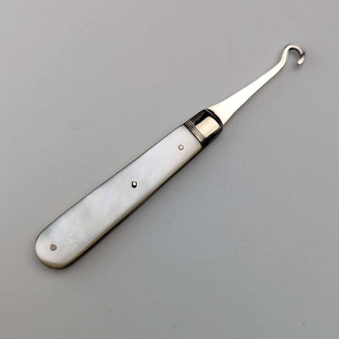 1904 British antique white mother-of-pearl handle and pure silver button hook by John Holmes