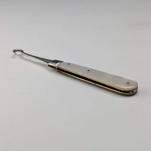 1904 British antique white mother-of-pearl handle and pure silver button hook by John Holmes