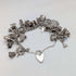 Pulsera de dijes de plata de ley vintage británica de 1970, 78 g, D&BS