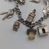 Pulsera de dijes de plata esterlina vintage británica de 1957, 47 g, W.J.S.