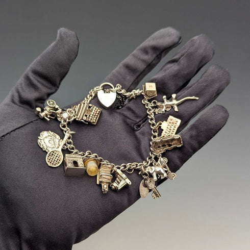 Pulsera de dijes de plata esterlina vintage británica de 1957, 47 g, W.J.S.