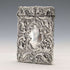 Antique American sterling silver card case with embossed decoration, 75g