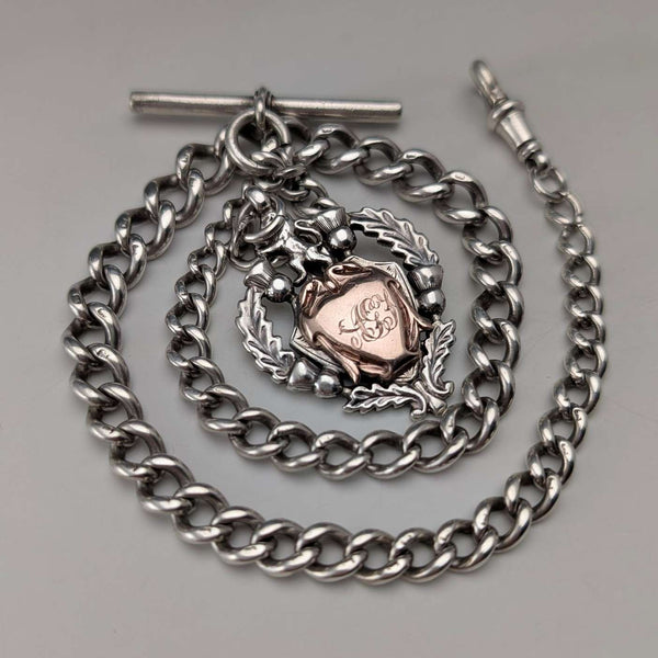 Circa 1910 British antique sterling silver Albert chain, 52g, sterling silver emblem fob