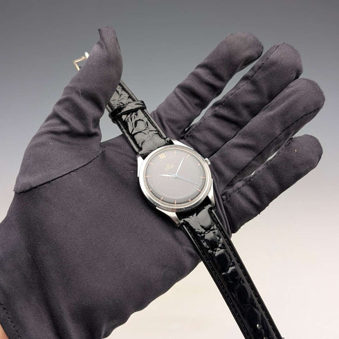 Reloj de pulsera para caballero Omega de 1945, ref. 2421/1, movimiento automático Cal. 28.10RA, esfera negra, caja de acero de 35 mm, en buen estado de funcionamiento.