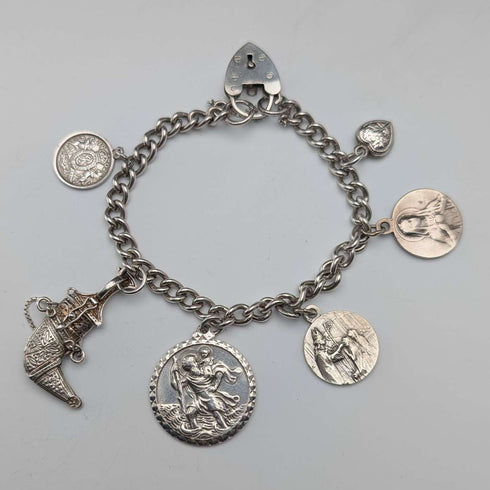 Pulsera de dijes de plata esterlina, vintage, de origen británico, circa 1970, 40 g