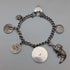 Pulsera de dijes de plata esterlina, vintage, de origen británico, circa 1970, 40 g