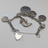 Pulsera de dijes de plata esterlina, vintage, de origen británico, circa 1970, 40 g