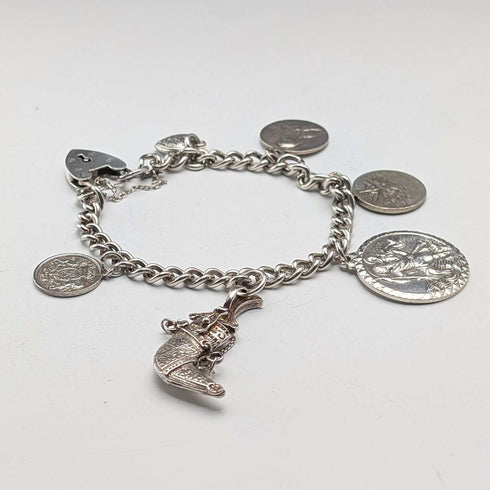 Pulsera de dijes de plata esterlina, vintage, de origen británico, circa 1970, 40 g