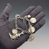 Pulsera de dijes de plata esterlina, vintage, de origen británico, circa 1970, 40 g