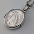 Colgante guardapelo vintage de plata pura con forma ovalada, 2.7g, con collar