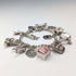 British vintage sterling silver charm bracelet, 48g, padlock clasp
