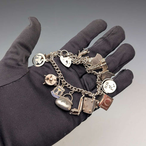 British vintage sterling silver charm bracelet, 48g, padlock clasp