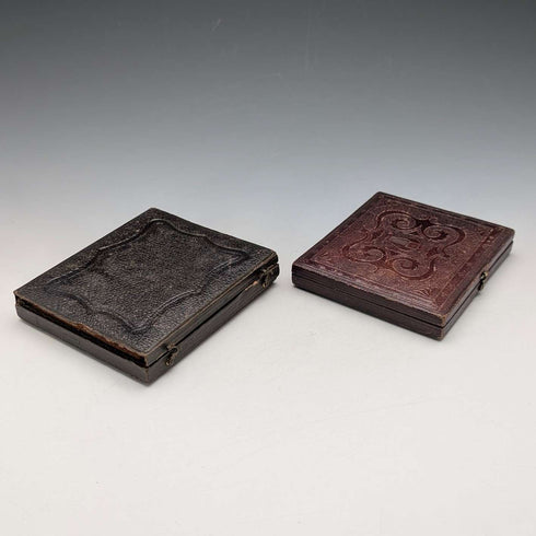 Par de daguerrotipos en estuche de cuero antiguo